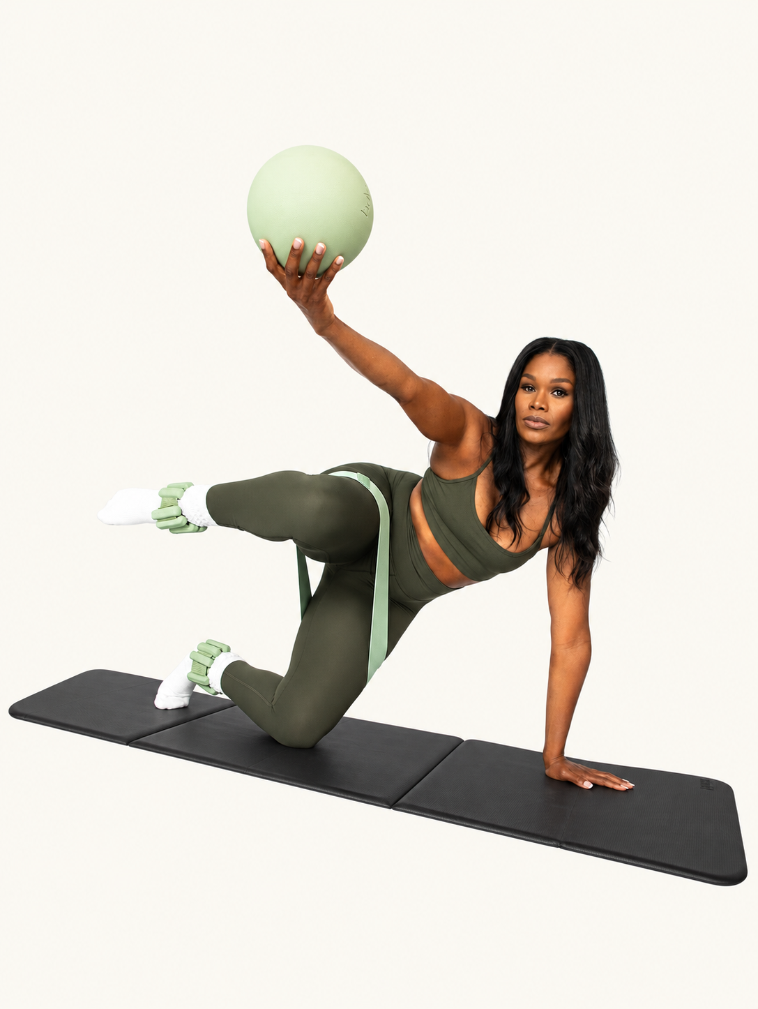 Elauq with her Pilates ball and complete mat